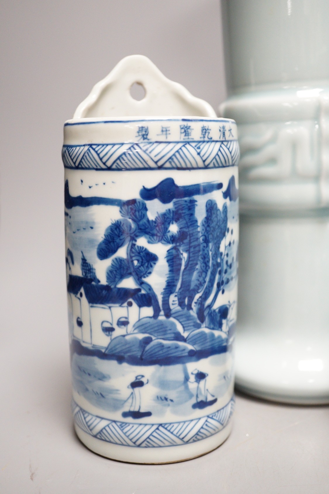 A Chinese blue and white vase, two jars, a beaker vase, a double gourd vase and a pearlware vase, tallest 31cm